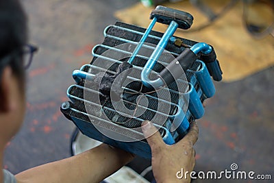 Car air conditioner evaporator coil close up.â€¨ Auto mechanic worker fixing air condition in car garage..MaintenanceÂ service, Stock Photo